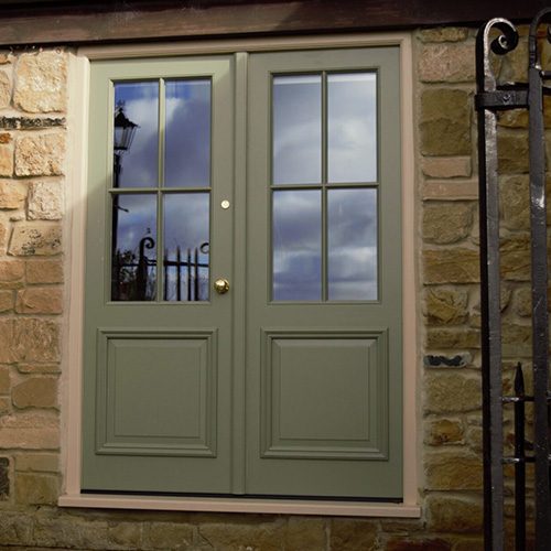 Made from high-performance, high quality Accoya® these contemporary French doors have been colour matched to Farrow & Ball No. 19 Lichen using Teknos paint. Door furniture is polished brass finish.